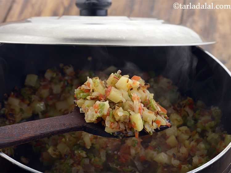 Step 7 – Cook on a medium flame for 10 minutes, but make sure you stir them in …