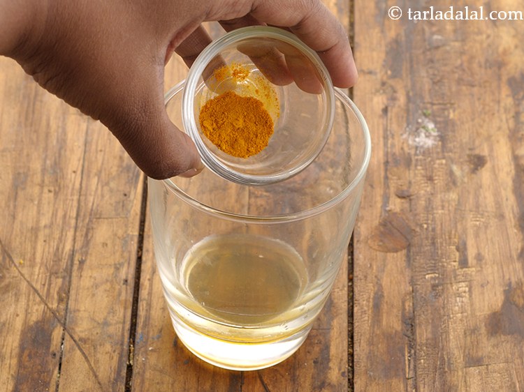 Step 9 – To this add &frac14; tsp of turmeric powder.&nbsp;