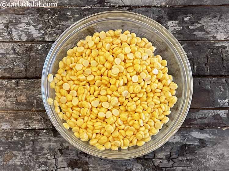 Step 13 – Drain.&nbsp;Keep aside washed and soaked chana dal.