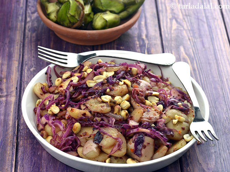 Step 22 – Serve <strong>water chestnuts and purple cabbage stir fry</strong> immediately garnished with peanuts.