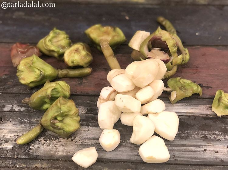 Step 7 – Peel the water chestnuts covering with a knife so the water chestnuts are ready to …