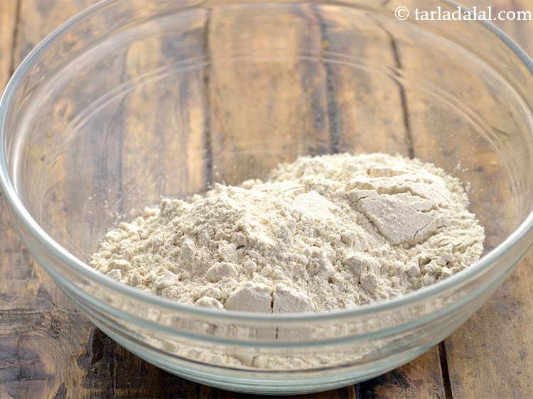 Step 7 – To prepare the Godhuma dosa batter recipe, in a bowl take the whole wheat flour.