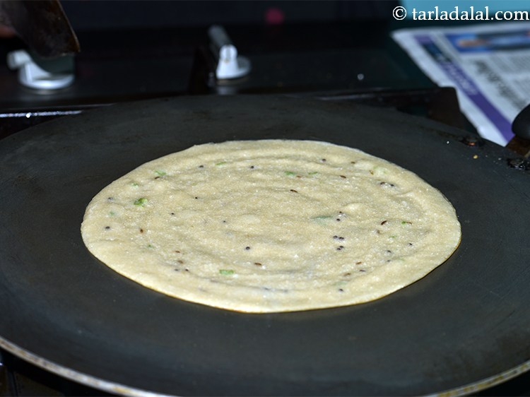 Step 26 – Cook the godhi dose on a medium flame till the dosa turns light brown in …
