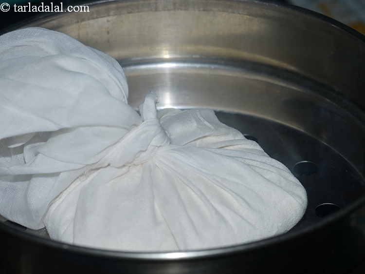 Step 6 – Place it in hot steamer. Remember to keep the tied muslin cloth on a perforated …