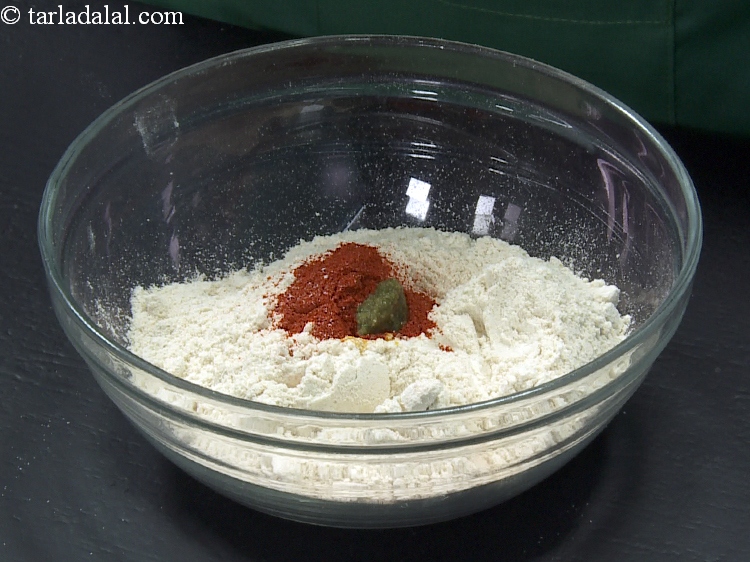 Step 15 – Add 1/2 tsp <a href="https://www.tarladalal.com/glossary-green-chilli-paste-hari-mirch-ki-paste-mirchi-paste-333i">green chilli paste</a>.