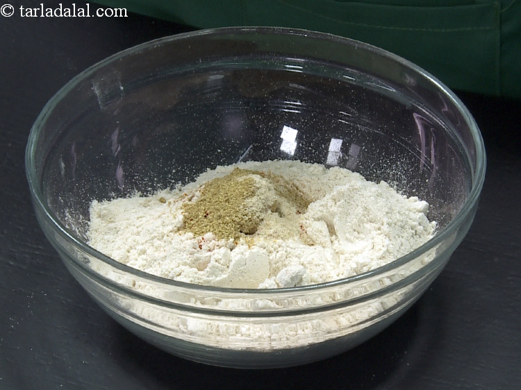Step 18 – Add 1/4 tsp <a href="https://www.tarladalal.com/glossary-asafoetida-hing-113i">asafoetida (hing)</a>.