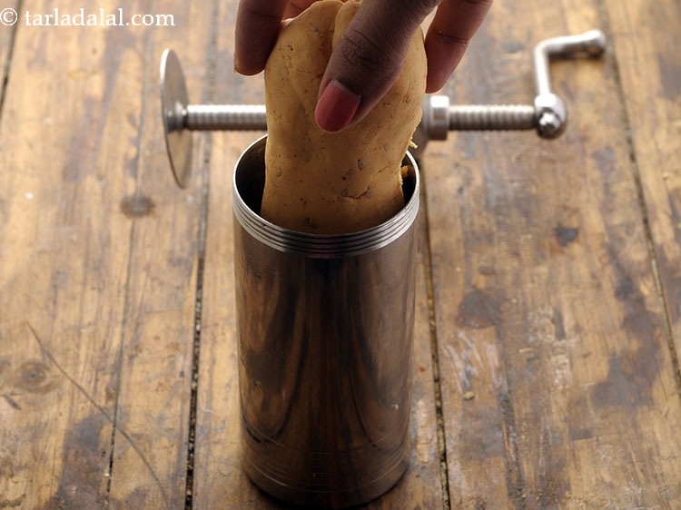Step 27 – Take a portion of the dough and shape it into a cylindrical roll.&nbsp;