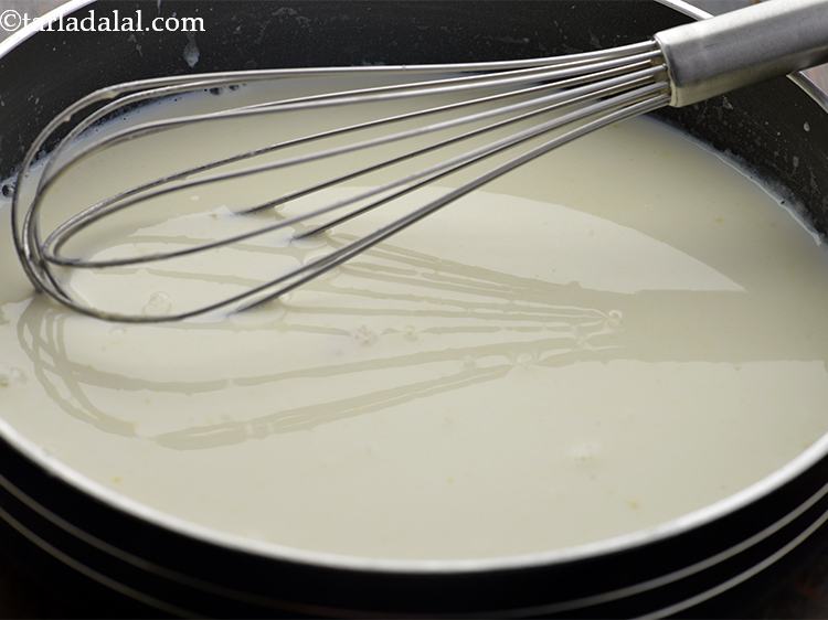 Step 5 – Once you see the flour has become a little froth and golden in colour, reduce …