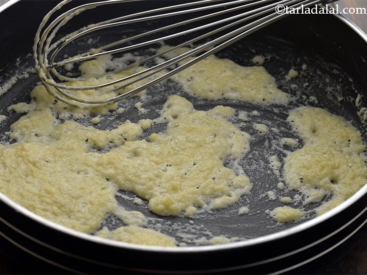 Step 5 – Once you see the flour has become a little froth and golden in colour, reduce …