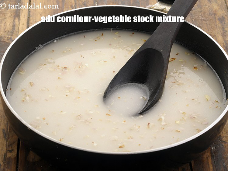 Step 11 – Add the cornflour-vegetable stock mixture. Whisk the slurry very well before adding into the hot, …