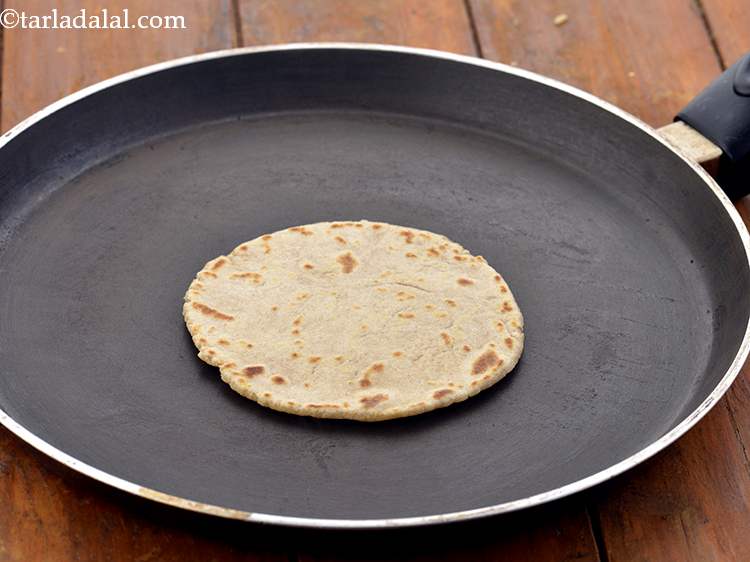 Step 15 – Cook it on a medium flame till it few light brown spots appear. Turn it …