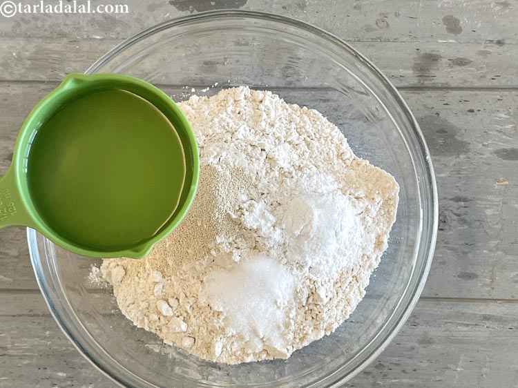 Step 7 – Add 1/2 cup warm water. Start kneading to make a soft dough. This will take …