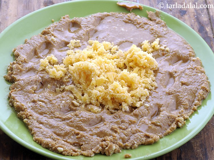 Step 10 – Once cooled slightly, add jaggery. The quantity can be adjusted as per the sweetness you …