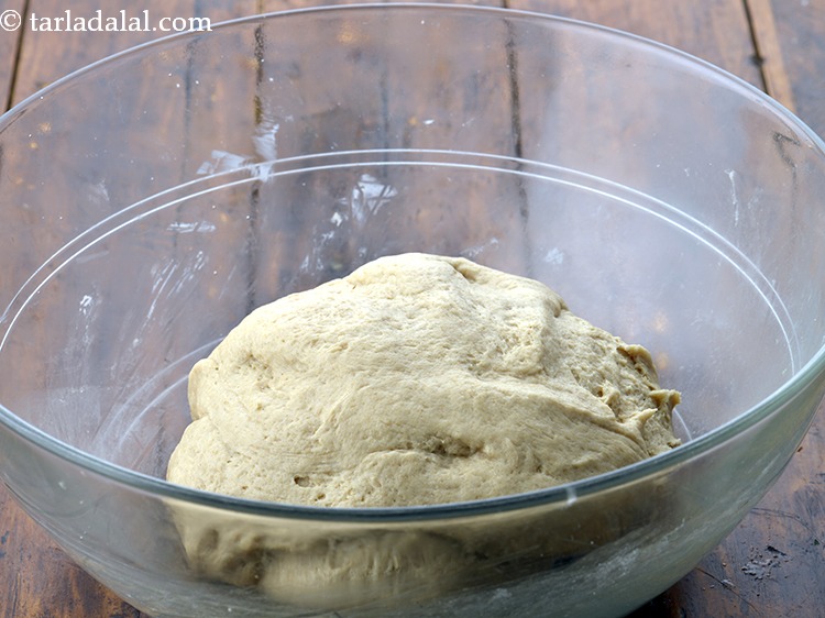 Step 24 – Add the oil-butter mixture and knead again for 3 to 4 minutes. The dough should …