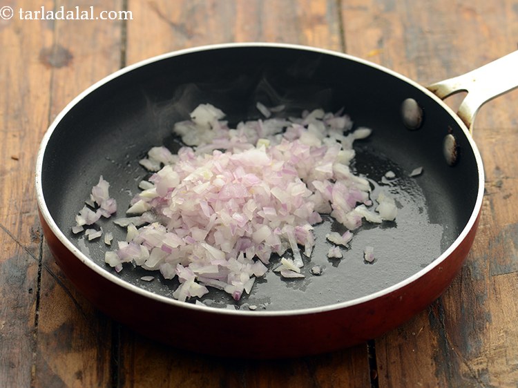 Step 3 – Once the oil is hot, add the onions.