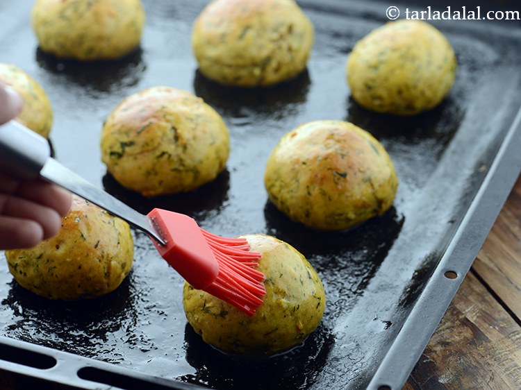 Step 33 – Brush them with melted butter.