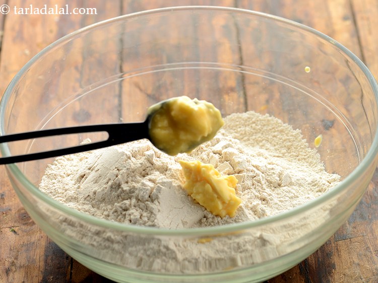 Step 17 – Add butter. Butter enriches the dough and makes softer &amp; more tender bread rolls.