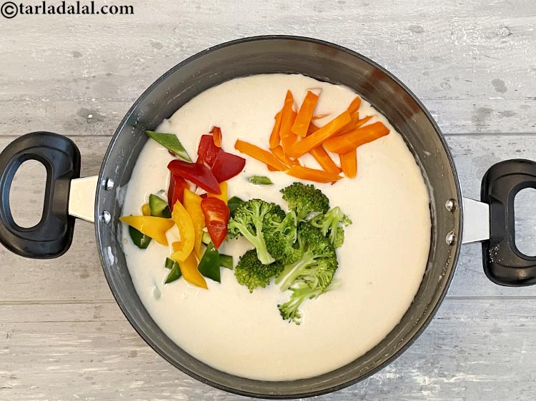 Step 16 – Add&nbsp;<meta charset="UTF-8" />1/2 cup&nbsp;blanched&nbsp;<a href="glossary-carrot-juliennes-754i">carrot juliennes</a>.