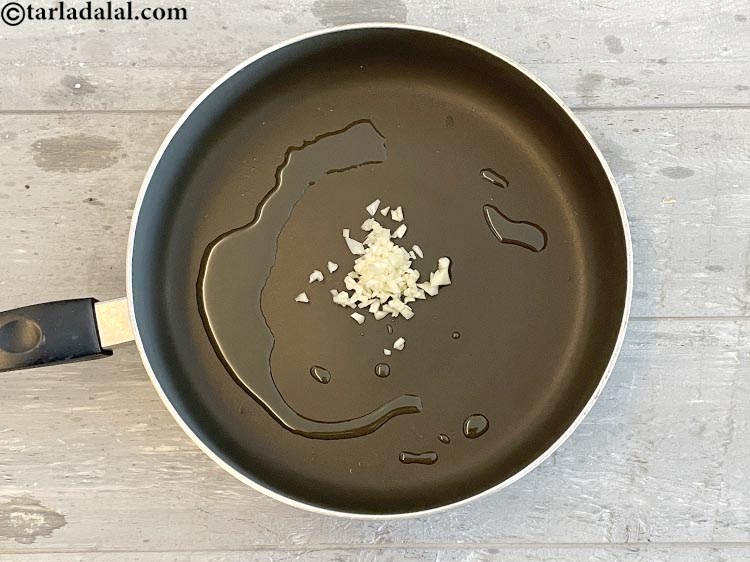 Step 7 – Add&nbsp;<meta charset="UTF-8" />1 tbsp&nbsp;finely&nbsp;<a href="glossary-chopped-garlic-790i">chopped garlic (lehsun)</a>.