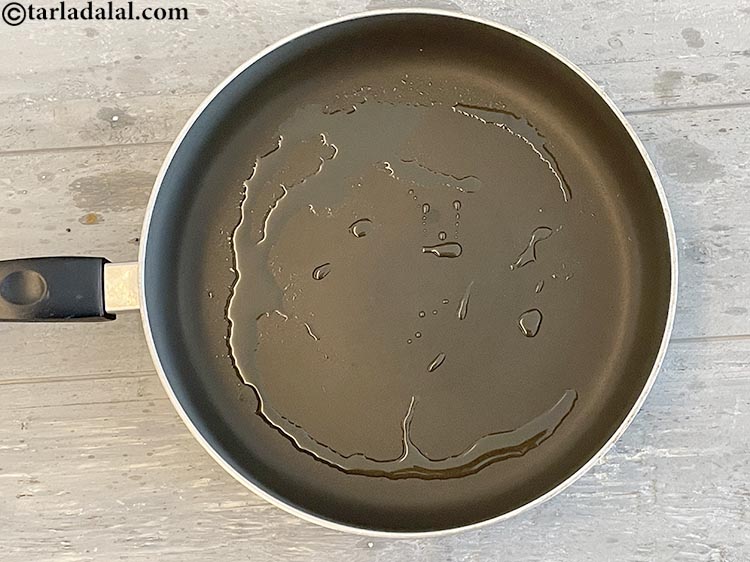 Step 22 – Heat 1 tsp olive&nbsp;oil in a broad non-stick pan.&nbsp;Olive oil is a&nbsp;<a href="https://www.tarladalal.com/recipes-for-Antioxidant-Rich-1054">strong antioxidant</a>&nbsp;and&nbsp;<a href="https://www.tarladalal.com/recipes-for-Healthy-Heart-377">good …