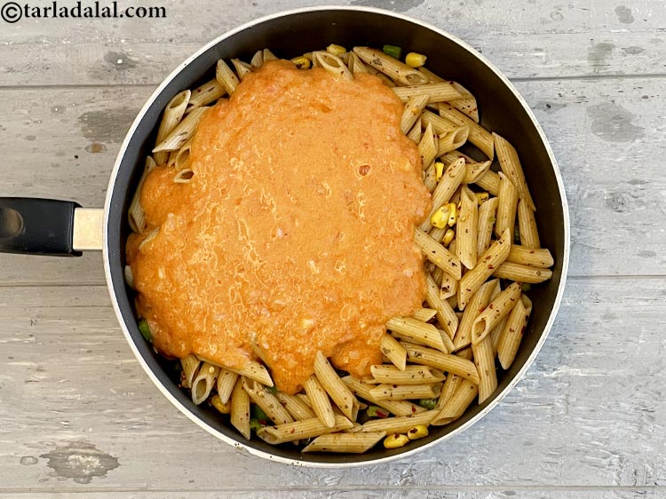 Step 34 – Add the tomato sauce.