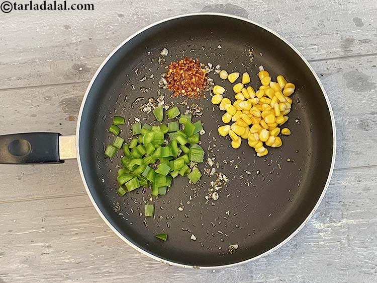 Step 28 – Add&nbsp;<meta charset="UTF-8" />1 tsp&nbsp;<a href="glossary-dry-red-chilli-flakes-paprika-338i">dry red chilli flakes (paprika)</a>.