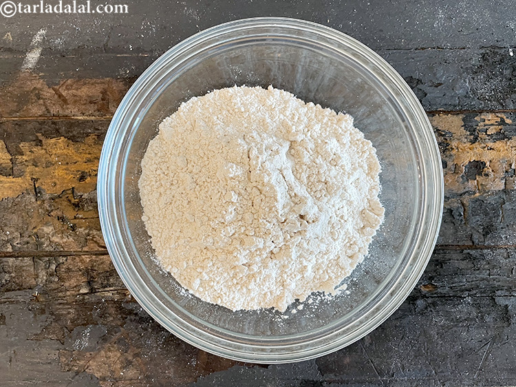 Step 11 – In a glass bowl put&nbsp;<meta charset="UTF-8" />1 1/2 cups&nbsp;<a href="glossary-whole-wheat-flour-gehun-ka-atta-gehun-ka-aata-429i">whole wheat flour (gehun ka atta)</a>.