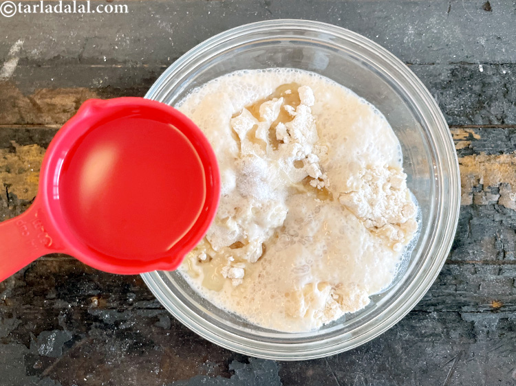 Step 15 – Add enough water to make a soft dough. We added 1/4 cup twice while making …