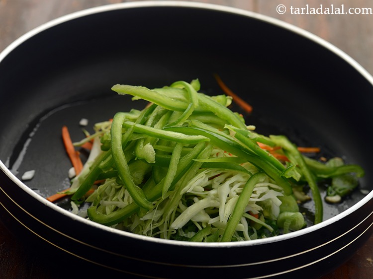 Step 14 – Add capsicum. Also, you can make use of bell peppers.