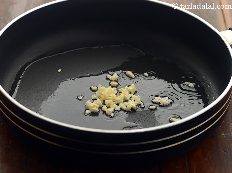 Step 10 – Once the oil is hot, add garlic. You can even toss in some ginger for …