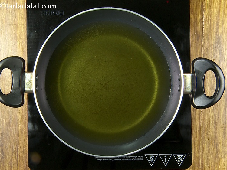 Step 24 – Heat the oil in a deep non-stick pan. You can test the same by adding …