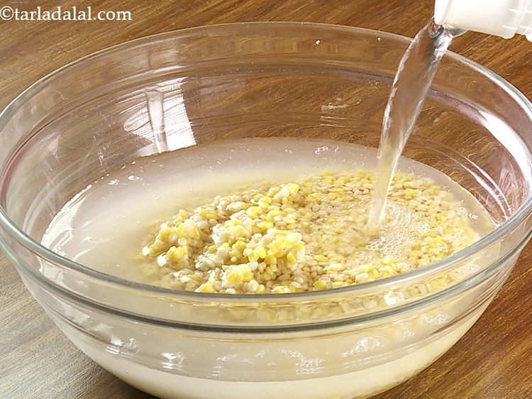 Step 6 – Transfer the dals into a deep bowl and pour enough water to submerge them.