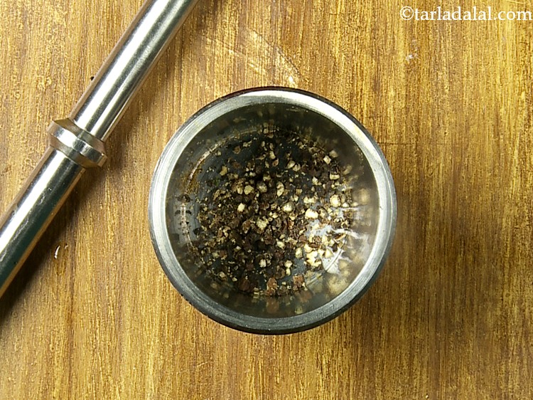 Step 9 – Also, take around 5 to 6 whole black pepper and coarsely crush them. Keep aside.