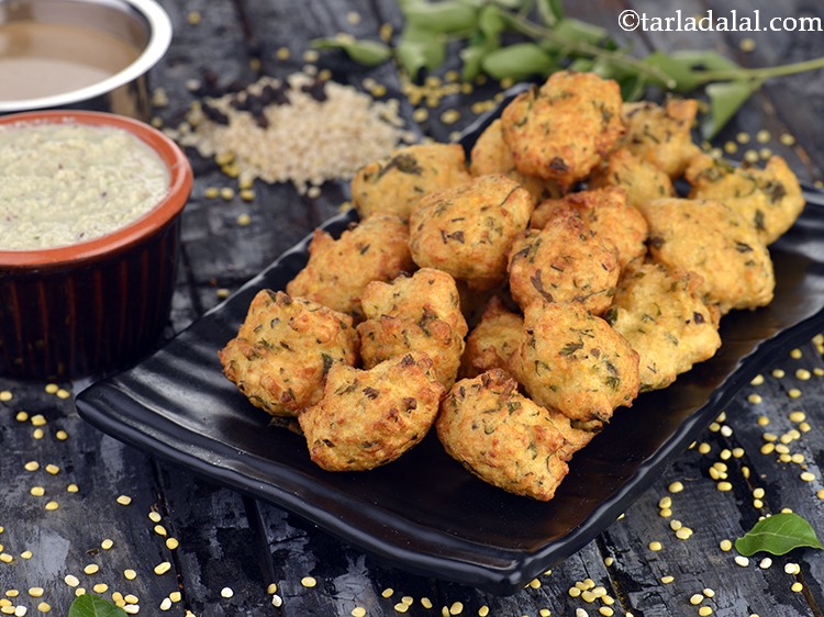 Step 28 – Serve immediately with coconut chutney. Serve the <strong>Yellow Moong and Urad Dal Pakoda</strong> with Coconut …