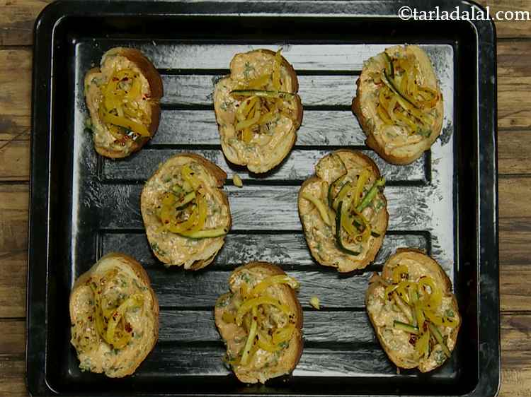 Step 17 – Then spread 1 portion of the topping evenly over each bread slice.