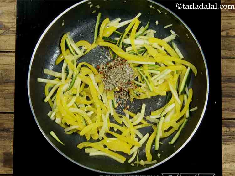 Step 6 – Also add oregano and salt, which gives a herby taste to the veggies. Fresh oregano …