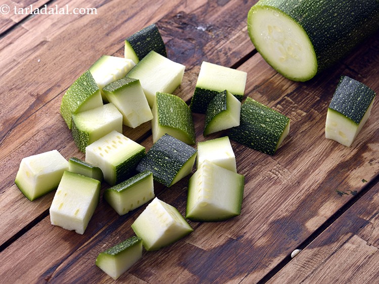 Step 25 – Add&nbsp;1/2 cup&nbsp;<a href="https://www.tarladalal.com/glossary-blanched-zucchini-1614i">blanched zucchini</a>&nbsp;cubes.&nbsp;<a href="https://www.tarladalal.com/recipes-using-zucchini-658">Zucchini</a>, as a matter of fact, is a water-filled low calorie …