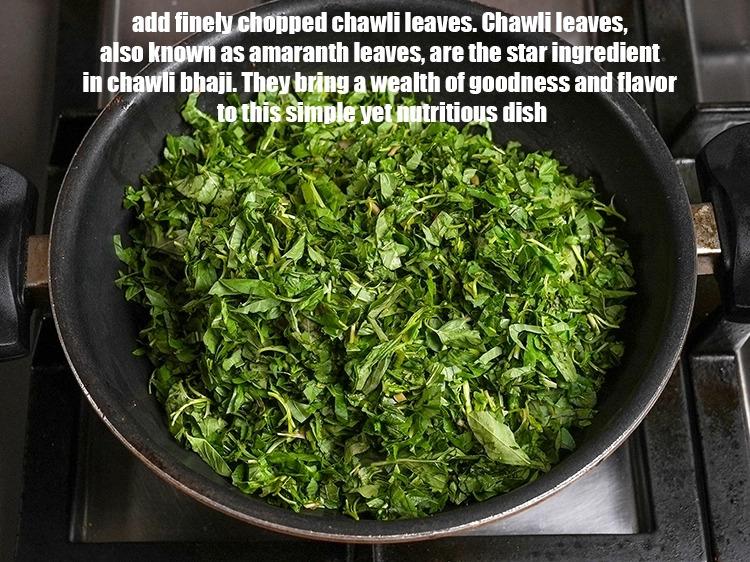 Step 13 – <p>Add 8 cups finely <a href="https://www.tarladalal.com/glossary-chopped-green-chawli-leaves-2048i">chopped chawli (cow pea / lobhia) leaves</a>. Chawli leaves, also …