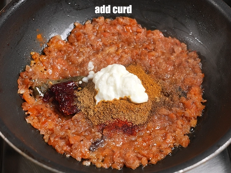 Step 35 – <p>Add a dollop of yogurt to the masala for richness and creaminess.</p>