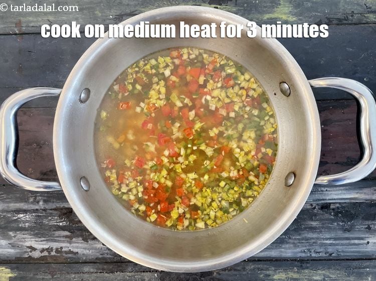 Step 18 – <p>Mix well and cook on a medium flame for 3 minutes, while stirring occasionally.&nbsp;Remove from …