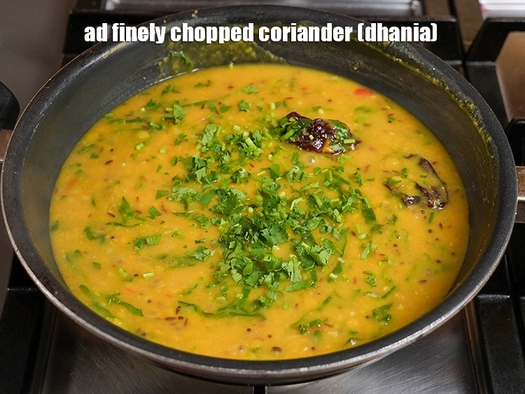 Step 26 – <p>Add finely chopped coriander (dhania).</p>