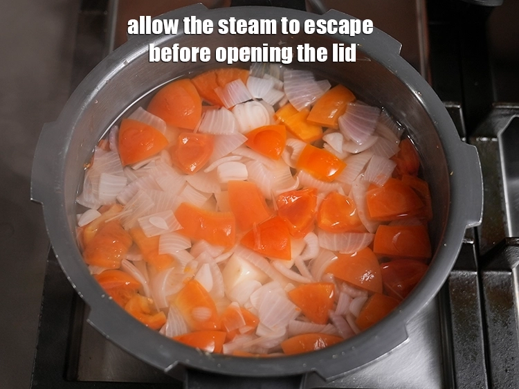 Step 7 – <p style="margin-left:0px;">Allow the steam to escape before opening the lid.</p>