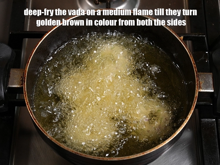 Step 23 – <p>Deep-fry the vada on a medium flame till they turn golden brown in colour from …