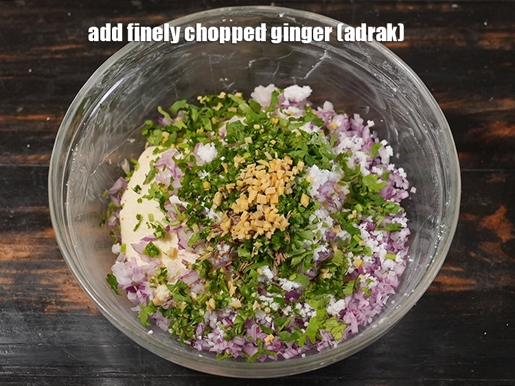 Step 10 – <p>Add 1 tsp&nbsp;finely&nbsp;<a href="https://www.tarladalal.com/glossary-chopped-ginger-786i">chopped ginger (adrak)</a>.</p>