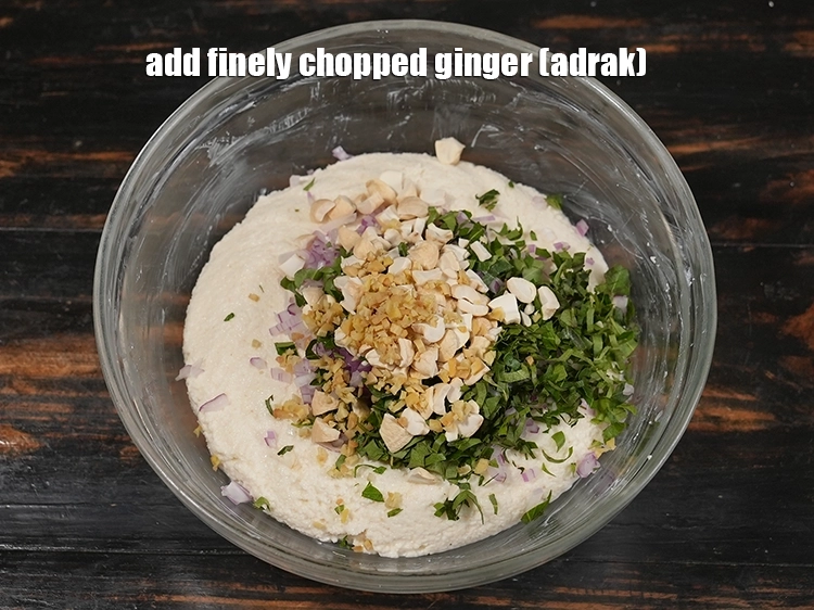 Step 12 – <p><span style="background-color:rgb(255,255,255);color:rgb(0,0,0);">Add 1 tsp finely </span><a href="https://www.tarladalal.in/glossary-ginger-adrak-453i#ing_2366"><u>chopped ginger (adrak)</u></a><u>.</u></p>