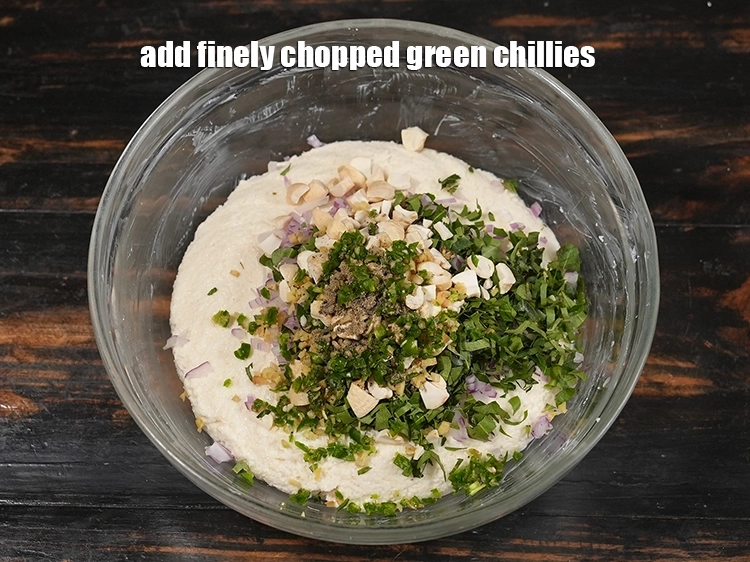 Step 13 – <p><span style="background-color:rgb(255,255,255);color:rgb(0,0,0);">Add 1 1/2 tsp finely </span><a href="https://www.tarladalal.in/glossary-green-chillies-hari-mirch-331i#ing_2388"><u>chopped green chillies</u></a>.</p>
