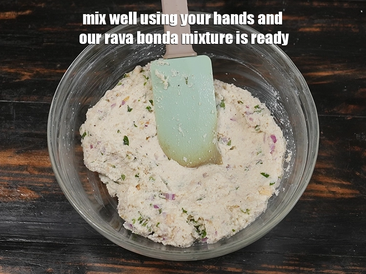 Step 16 – <p><span style="background-color:rgb(255,255,255);color:rgb(0,0,0);">Mix well using your hands and our rava bonda mixture is ready.</span></p>