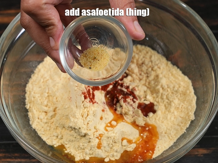 Step 36 – <p><span style="background-color:rgb(255,255,255);color:rgb(0,0,0);">Add</span><strong>&nbsp;</strong><span style="background-color:rgb(255,255,255);color:rgb(0,0,0);">a pinch of&nbsp;</span><a href="https://www.tarladalal.com/glossary-asafoetida-hing-113i">asafoetida (hing)</a><span style="background-color:rgb(255,255,255);color:rgb(0,0,0);">.</span></p>