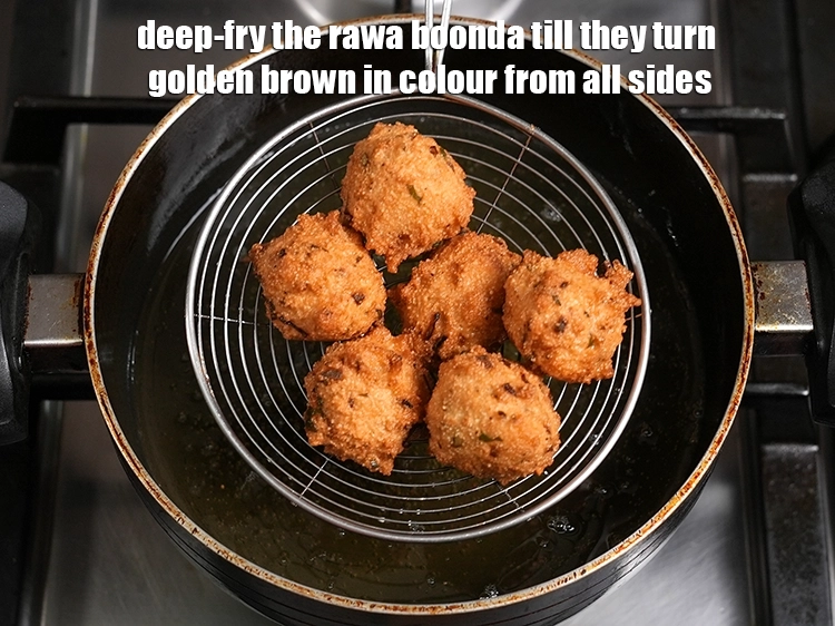 Step 22 – <p><span style="background-color:rgb(255,255,255);color:rgb(0,0,0);">Deep-fry the </span><strong>rawa boonda</strong><span style="background-color:rgb(255,255,255);color:rgb(0,0,0);"> till they turn golden brown in colour from all …