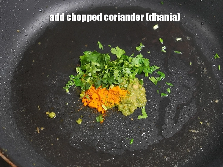 Step 19 – <p><span style="background-color:rgb(255,255,255);color:rgb(0,0,0);">Add 1 tbsp&nbsp;</span><a href="https://www.tarladalal.com/glossary-chopped-coriander-783i">chopped coriander (dhania)</a><span style="background-color:rgb(255,255,255);color:rgb(0,0,0);">.</span></p>